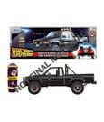 Back to the Future Veicolo Diecast 1:24 con Skateboard di Marty e Toyota 1985 Jada Toys