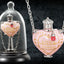 Harry Potter Ciondolo Pozione d'Amore con Base Espositiva - Noble Collection